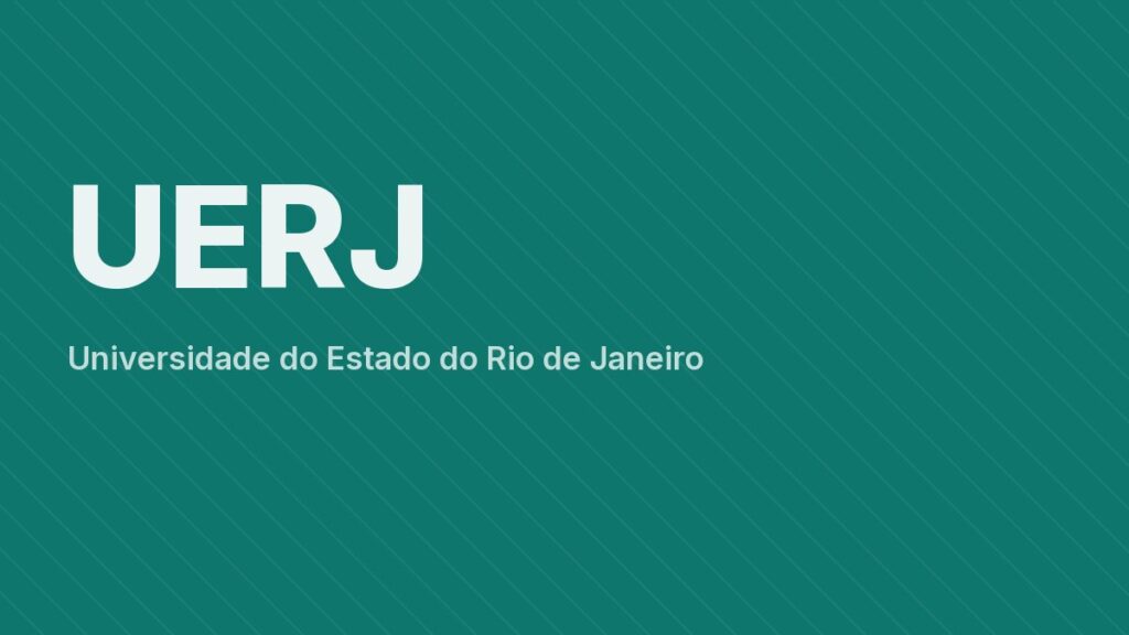 Vista aérea do campus Maracanã da UERJ ao entardecer, com a Torre da UERJ em destaque e o entorno urbano do Rio de Janeiro.